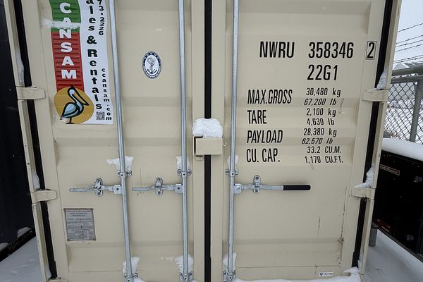 40 foot high cube shipping container with C-Can Sam branding in Saskatchewan winter